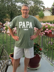 Happy customer wearing Papa tee