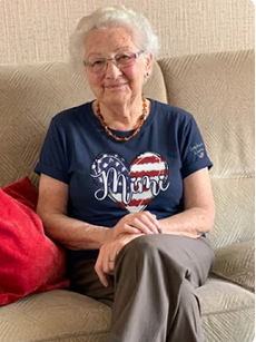 Happy customer wearing Mimi tee