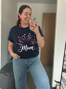 Happy customer wearing Mom tee